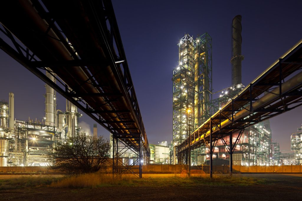 Pipelines And Refinery At Night